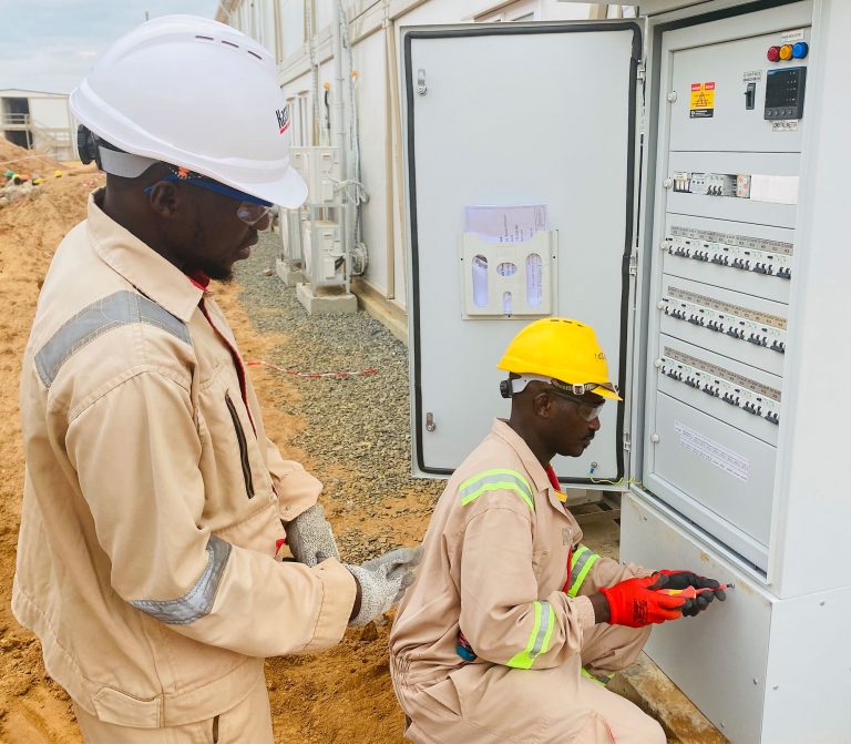 Rohi-construction-company-electricians-terminating-electrical-DB-in-tilenga